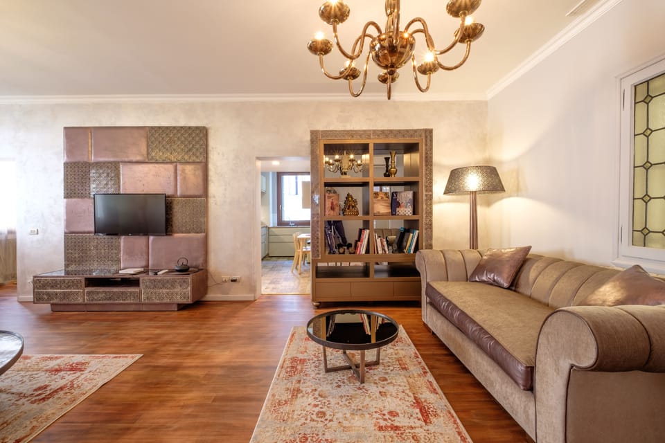 Luxury Apartment | Living area | Flat-screen TV