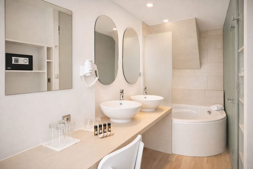 Separate tub and shower, free toiletries, hair dryer, bathrobes