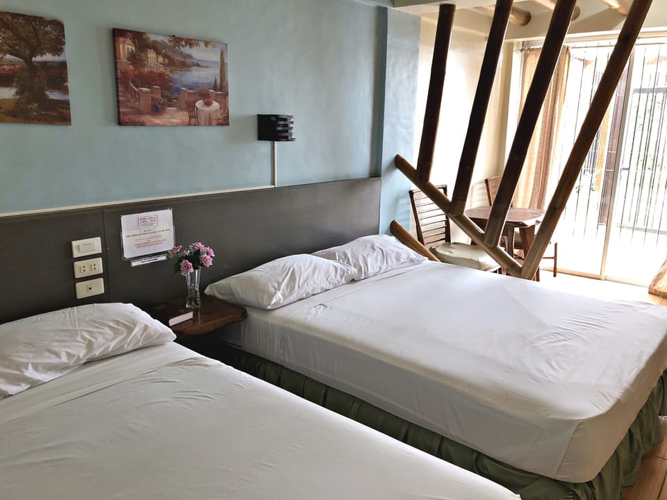 Algaida | Desk, blackout drapes, iron/ironing board, bed sheets