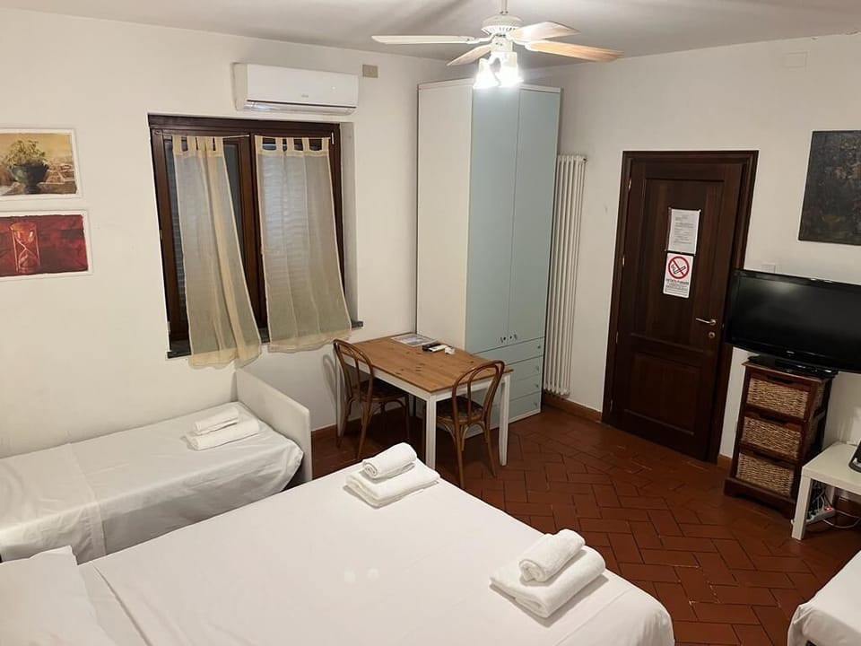 Quadruple Room (Room 02) | Desk, WiFi (free), bed sheets
