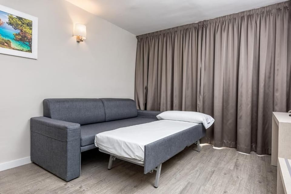 Blackout drapes, iron/ironing board, free WiFi, bed sheets