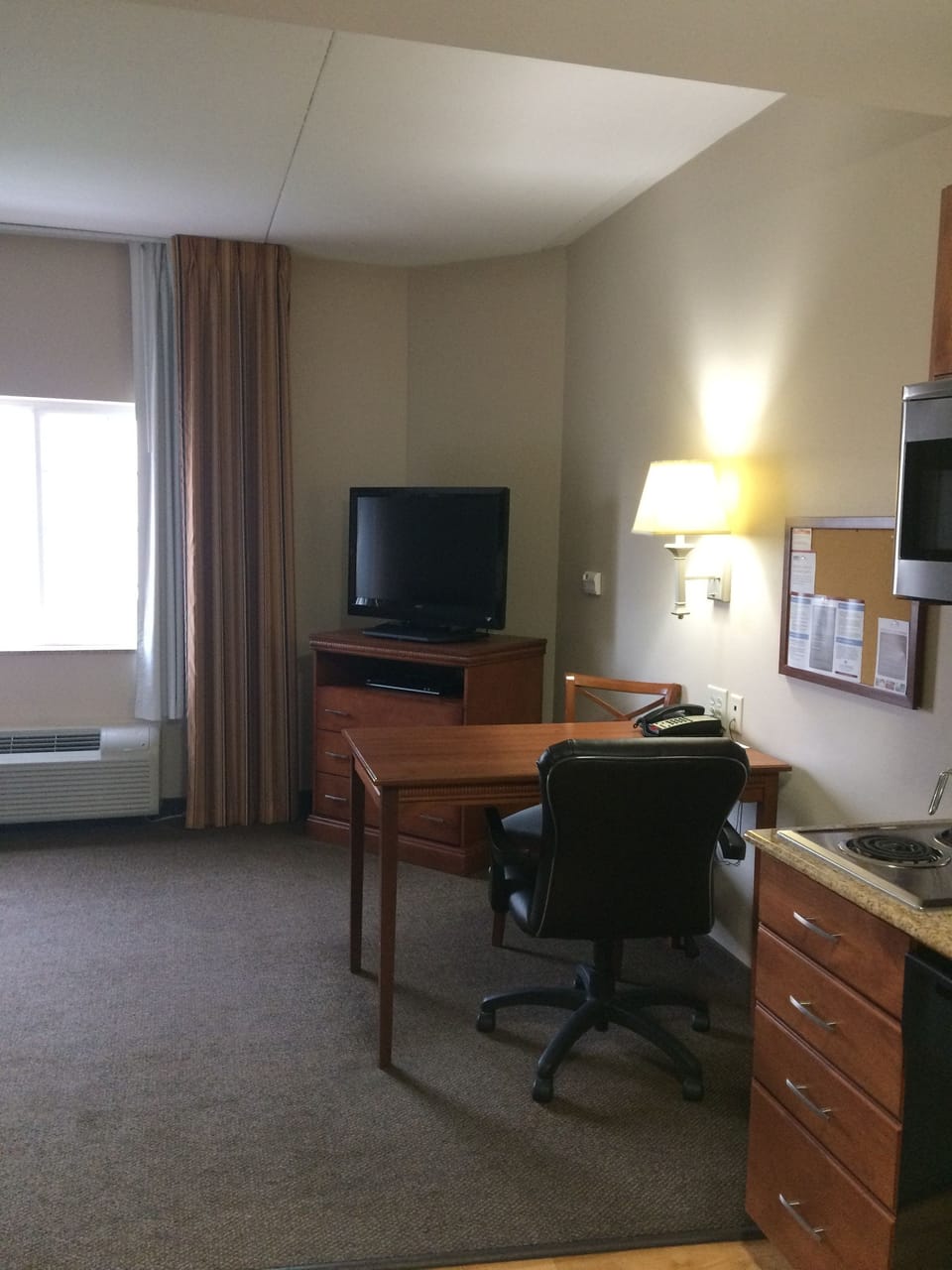 Desk, blackout drapes, soundproofing, iron/ironing board