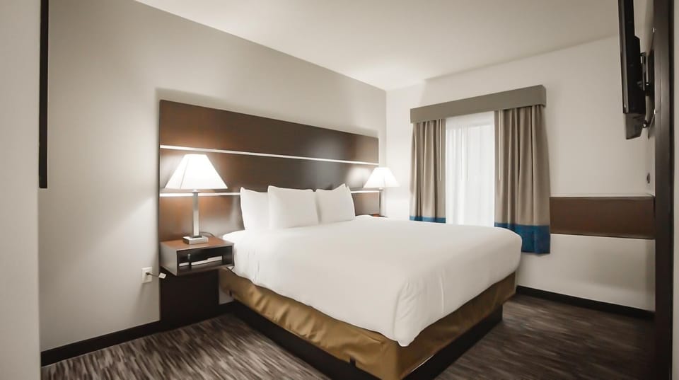 Down comforters, pillowtop beds, in-room safe, desk