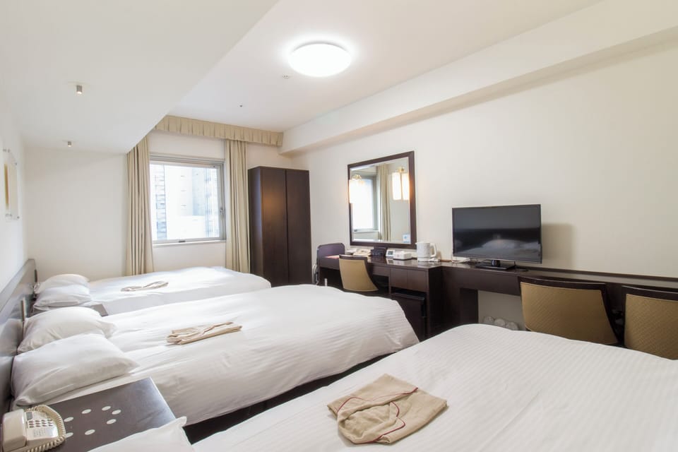 Premium bedding, desk, blackout drapes, iron/ironing board