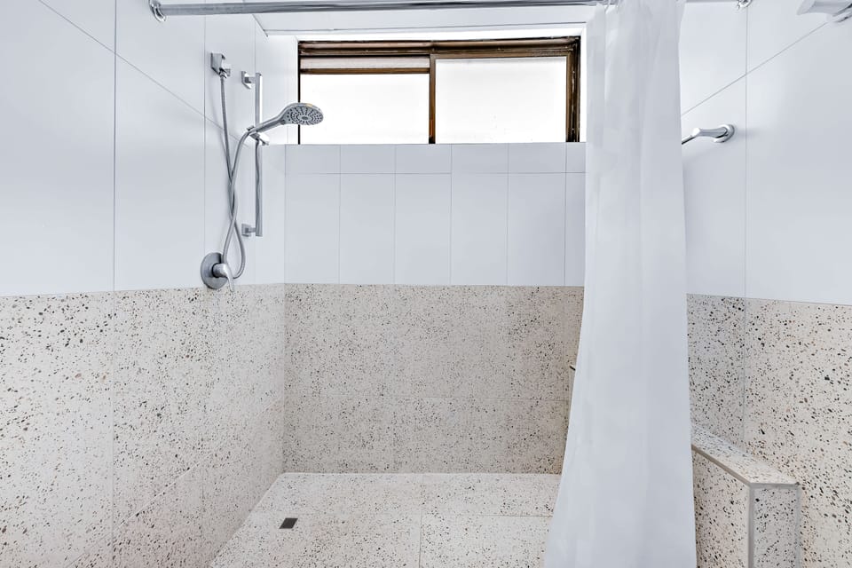 Panoramic Apartment, 1 Bedroom, Ocean View | Bathroom | Shower, rainfall showerhead, hair dryer, towels
