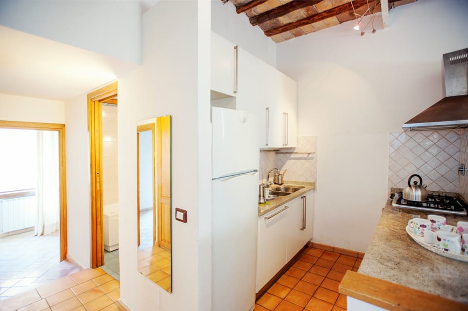 Apartment, 2 Bedrooms | Private kitchen | Full-size fridge, stovetop, cookware/dishes/utensils