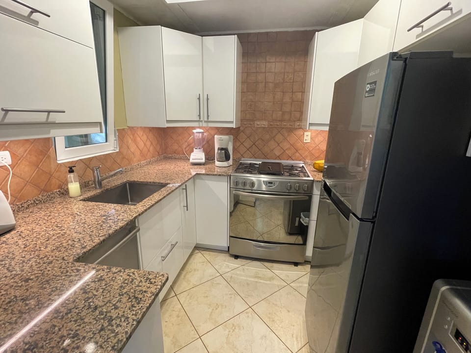 Family Condo, Multiple Beds, Non Smoking (211) | Private kitchen