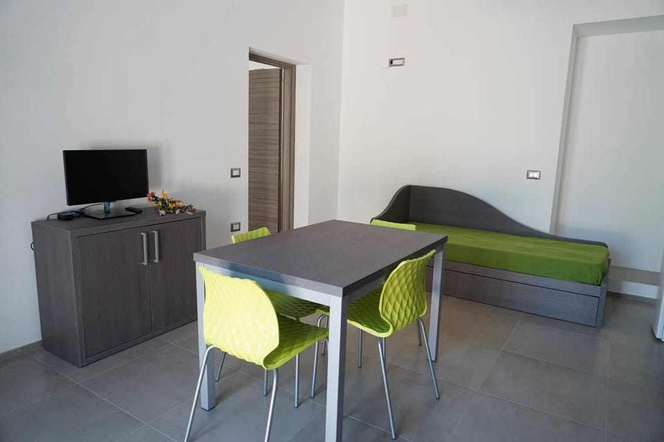Deluxe Apartment, 1 Bedroom | Living area | LCD TV