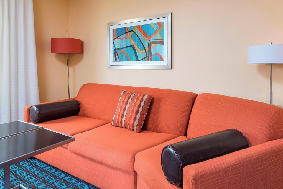 Executive Suite, 1 King Bed with Sofa bed | Living area | Flat-screen TV