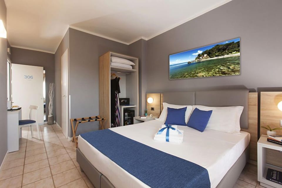 Panoramic Double or Twin Room, Partial Sea View | Premium bedding, down comforters, memory foam beds, minibar