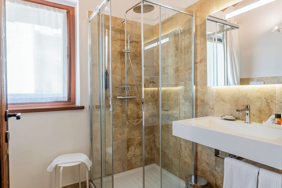 Family Room, Connecting Rooms, Garden View | Bathroom | Shower, free toiletries, hair dryer, bidet