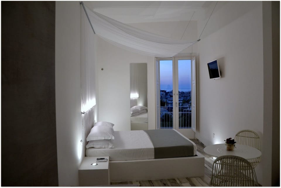 Deluxe Double Room, Terrace, Sea View | Minibar, in-room safe, desk, soundproofing