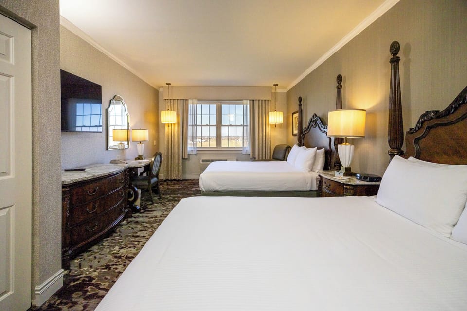 Deluxe Room, 2 Queen Beds, Bathtub, Garden View | Desk, laptop workspace, blackout drapes, iron/ironing board