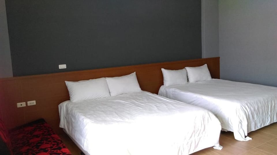 Standard Quadruple Room, 1 Bedroom | Desk, blackout drapes, free WiFi, bed sheets