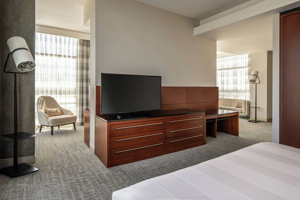 Premium bedding, down comforters, pillowtop beds, in-room safe