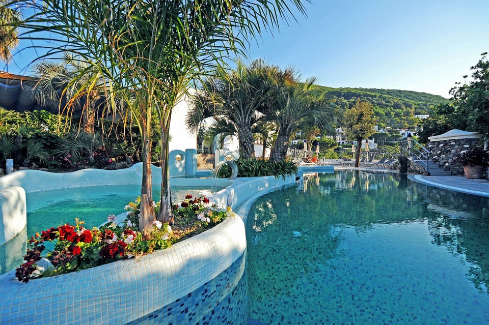 4 outdoor pools, open 9:00 AM to 7:30 PM, pool umbrellas, sun loungers