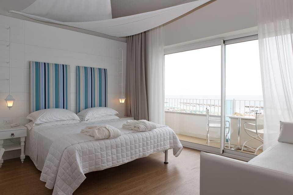 Premium bedding, down comforters, minibar, in-room safe