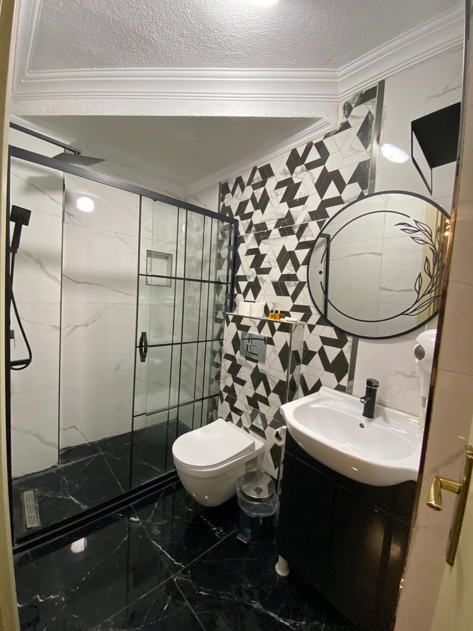 Shower, free toiletries, hair dryer, slippers