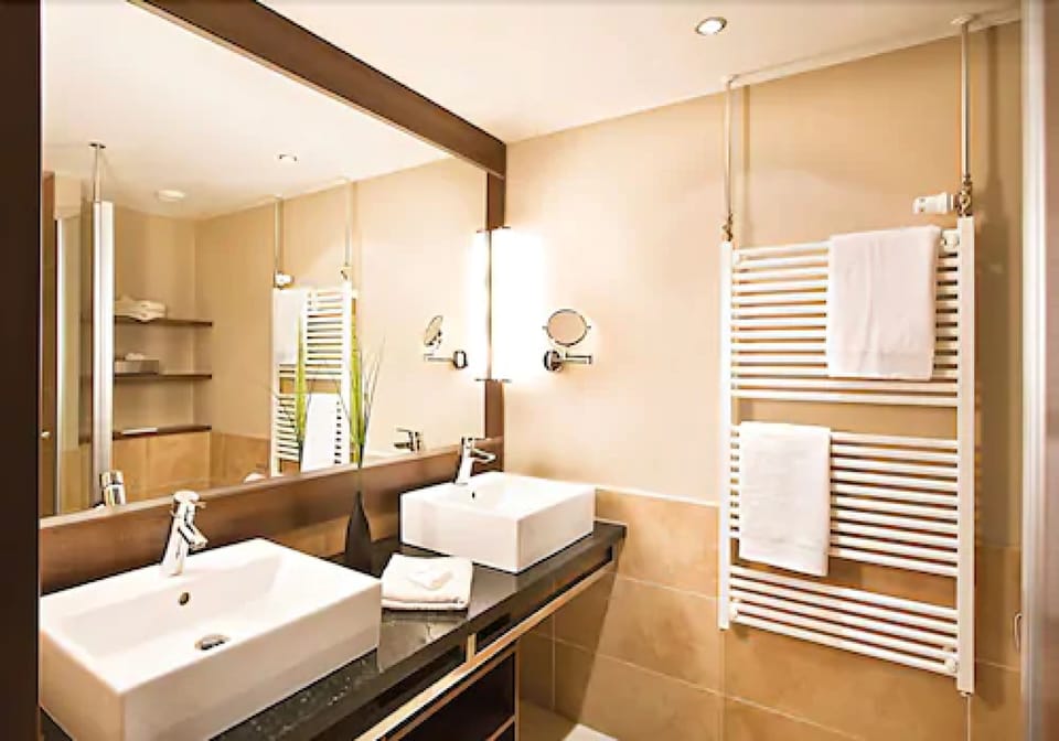 Shower, hair dryer, bathrobes, towels