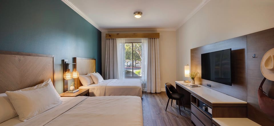 Premium bedding, down comforters, pillowtop beds, in-room safe