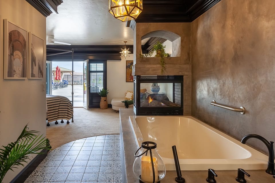 Luxury Suite, 1 King Bed, Fireplace, River View (Spanish Decor) | Courtyard view