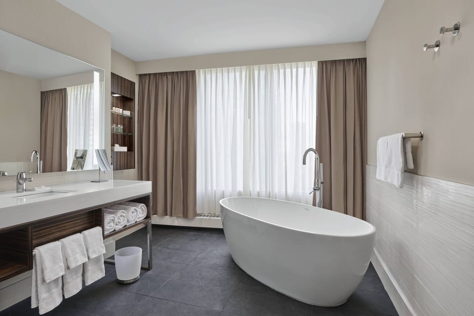 Premium bedding, pillowtop beds, desk, blackout drapes