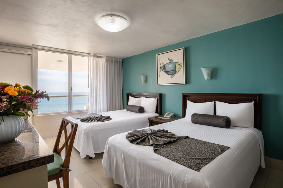 Standard Room, Ocean View | In-room safe, blackout drapes, free WiFi, bed sheets