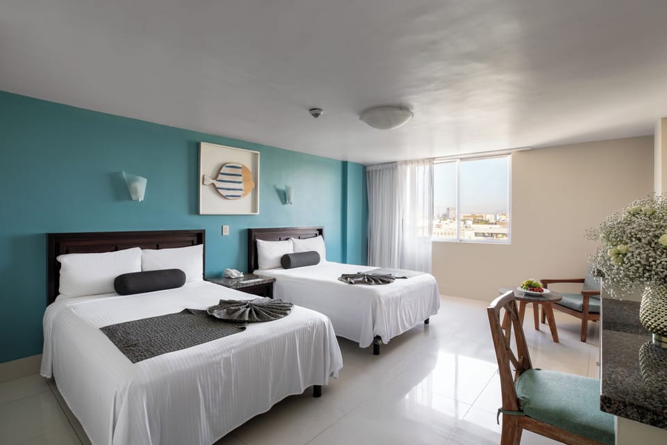 Standard Room, Lagoon View | In-room safe, blackout drapes, free WiFi, bed sheets