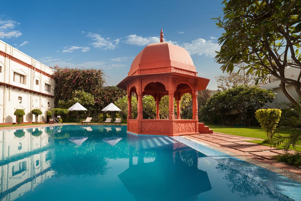 Outdoor pool, pool umbrellas, sun loungers