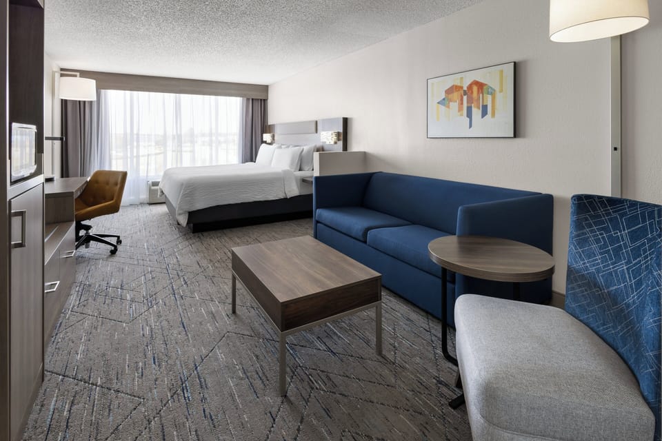 Suite, 1 King Bed with Sofa bed | In-room safe, desk, iron/ironing board, free WiFi