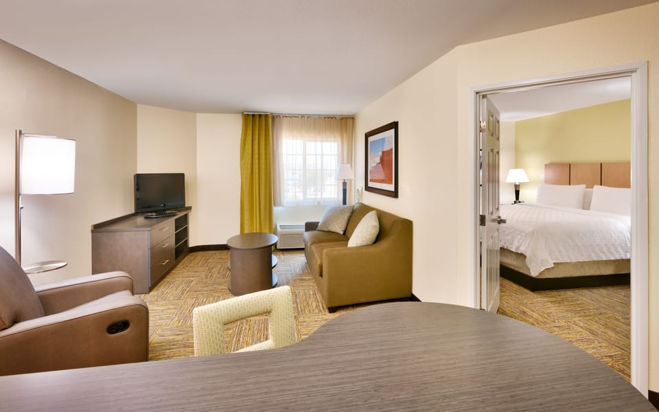 Suite, 1 Bedroom | Down comforters, in-room safe, individually decorated