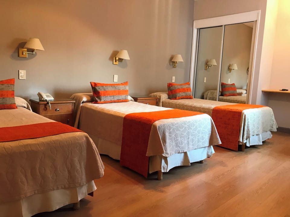 Standard Triple Room, 1 Bedroom | Premium bedding, down comforters, pillowtop beds, in-room safe