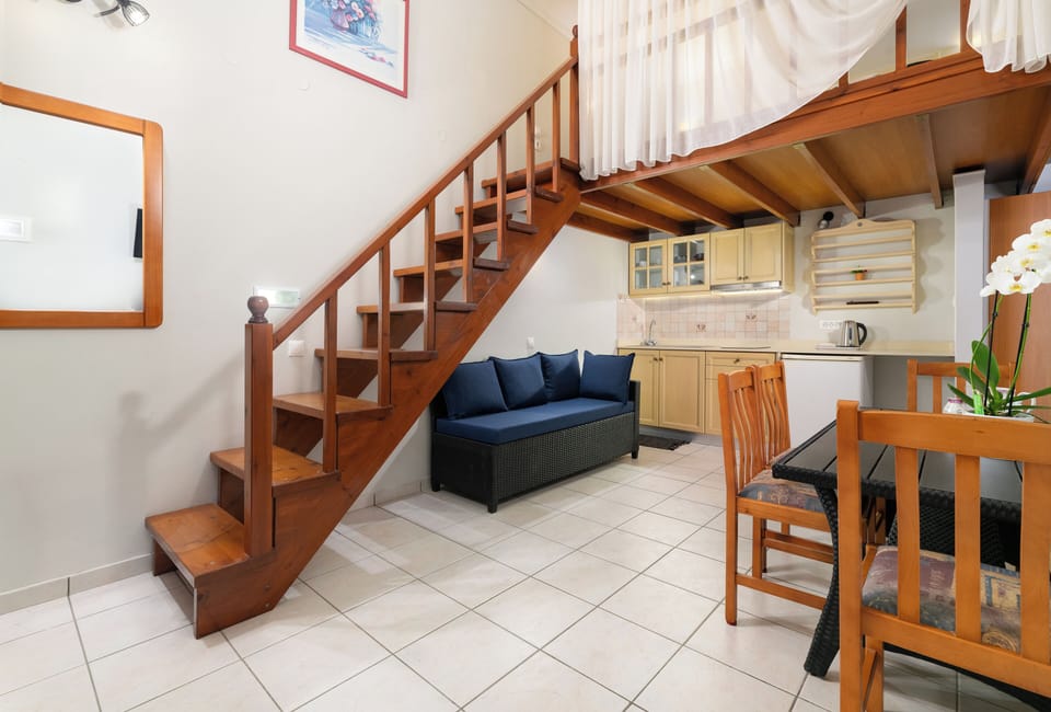 Standard Apartment | Living area | 32-inch flat-screen TV with satellite channels, TV