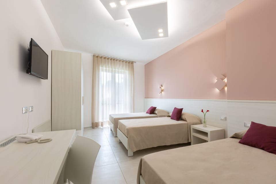 Triple Room | In-room safe, desk, soundproofing, cribs/infant beds