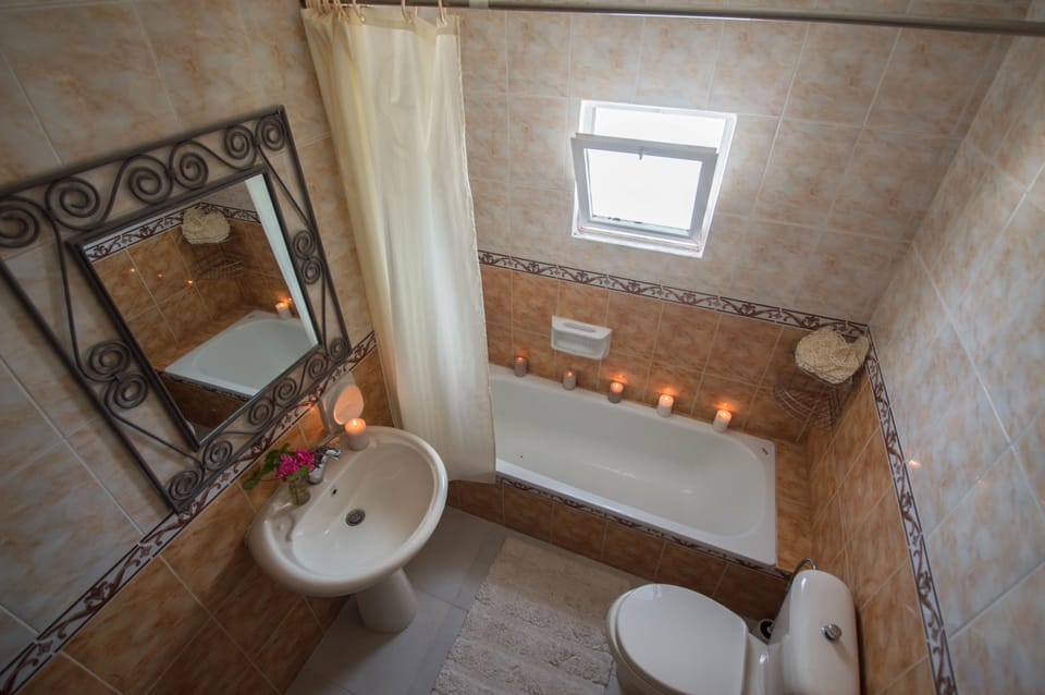 Hair dryer, slippers, towels
