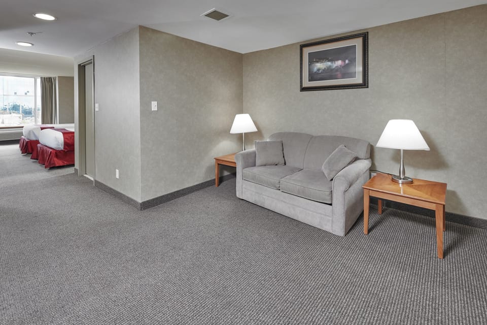 Family Suite, Multiple Beds, Refrigerator & Microwave, Tower | Iron/ironing board, rollaway beds, free WiFi, bed sheets