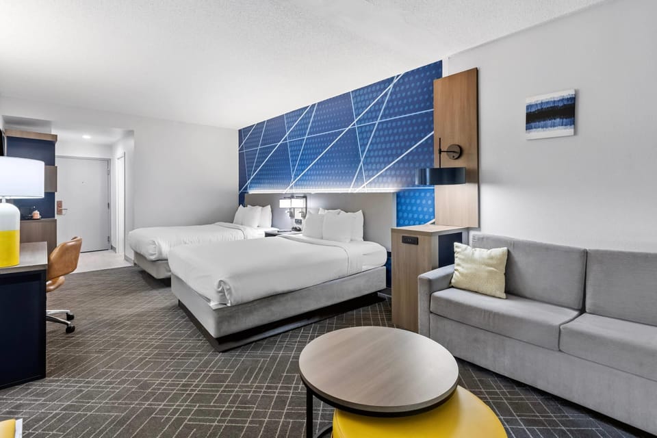 Suite, 2 Queen Beds, Non Smoking | In-room safe, desk, iron/ironing board, cribs/infant beds