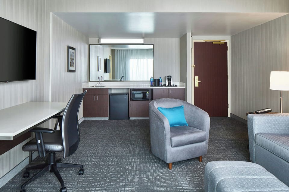 Suite, 1 Bedroom, Balcony | Living room | 55-inch Smart TV with cable channels, Netflix, Hulu