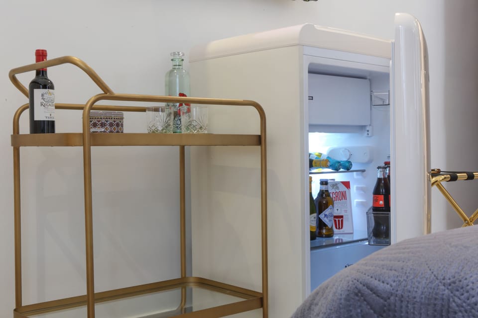 Deluxe Room | 1 bedroom, down comforters, minibar, individually decorated
