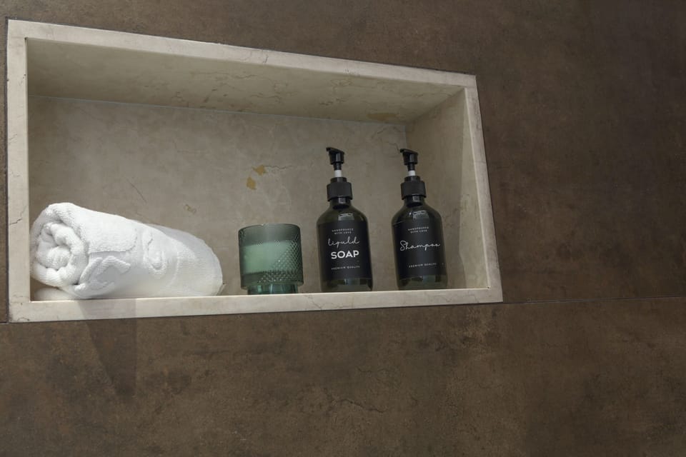 Exclusive Room, 1 Queen Bed, Balcony, City View | Bathroom | Shower, free toiletries, hair dryer, slippers