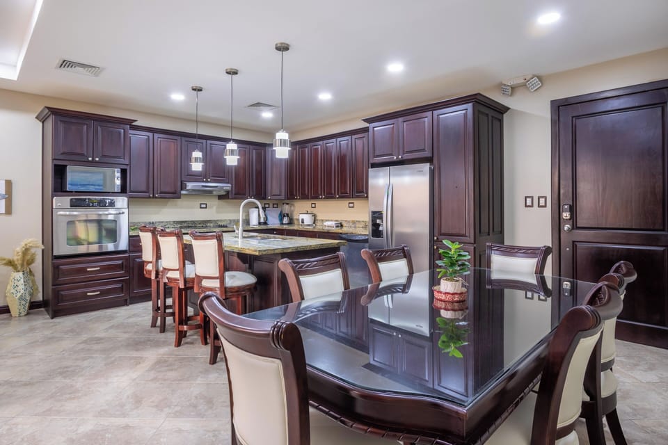 Junior Condo, 3 Bedrooms, Bathtub, Tower | Private kitchen | Full-size fridge, microwave, oven, stovetop