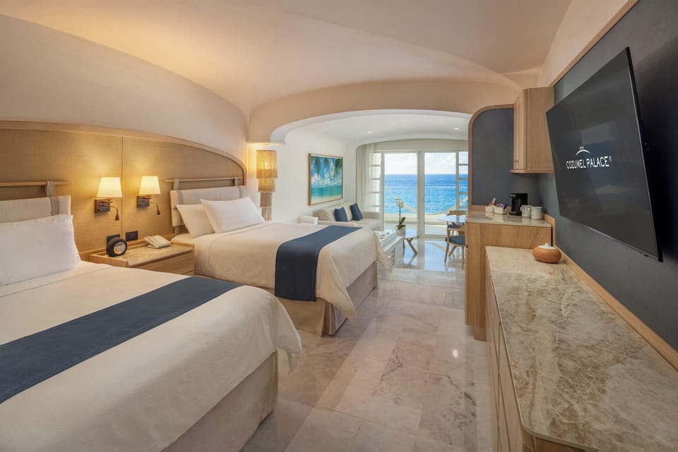 Premium bedding, pillowtop beds, free minibar, in-room safe