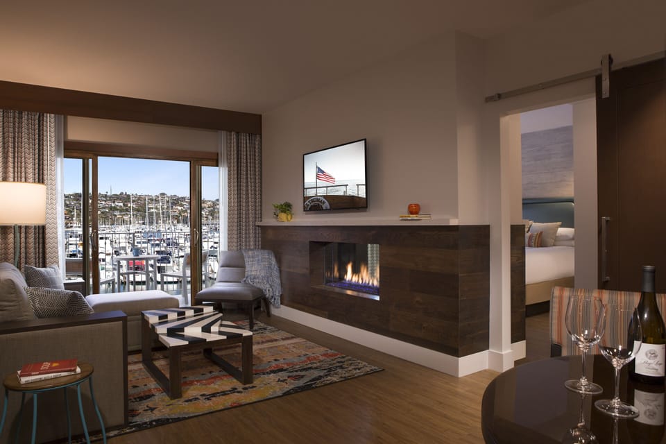 Waterview One Bedroom Suite | Living area | 42-inch flat-screen TV with digital channels, TV, iPod dock