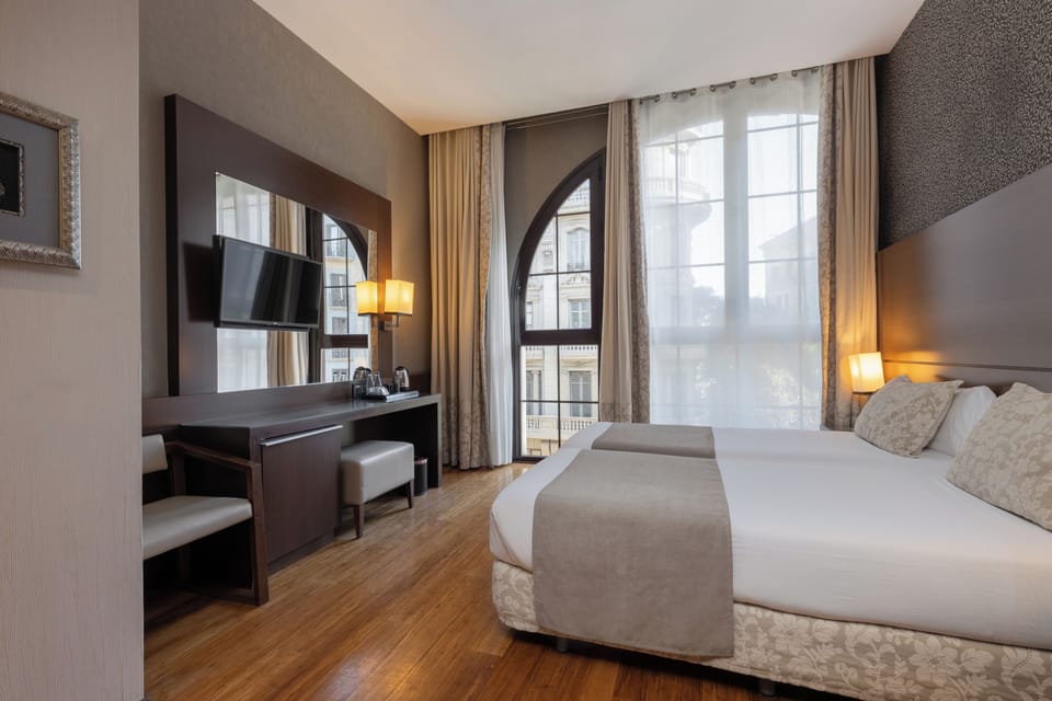 In-room safe, desk, laptop workspace, blackout drapes