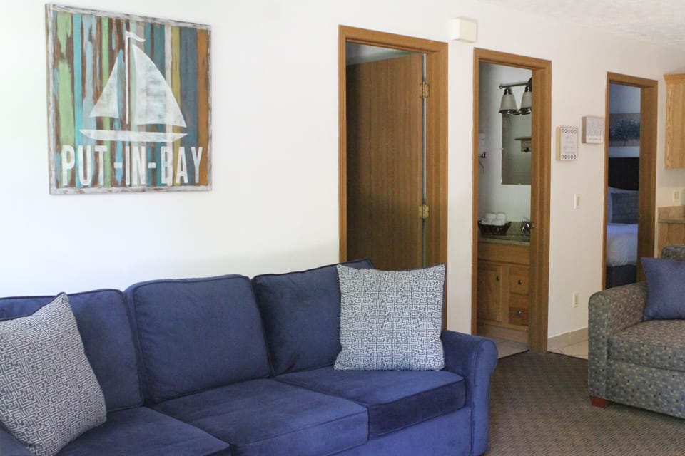 Suite, 2 Bedrooms | Living area | 27-inch flat-screen TV with satellite channels, TV