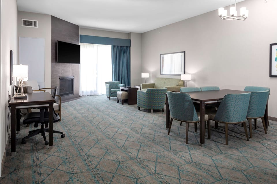 Suite, 1 King Bed, Non Smoking | Hypo-allergenic bedding, desk, laptop workspace, blackout drapes