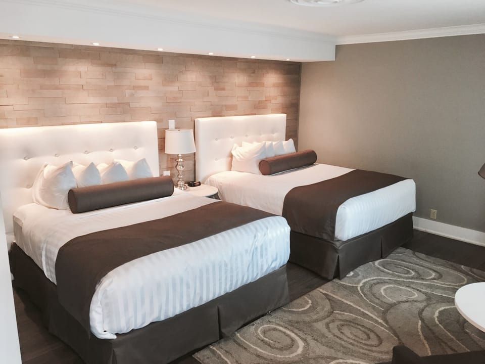 Premium bedding, down comforters, pillowtop beds, desk