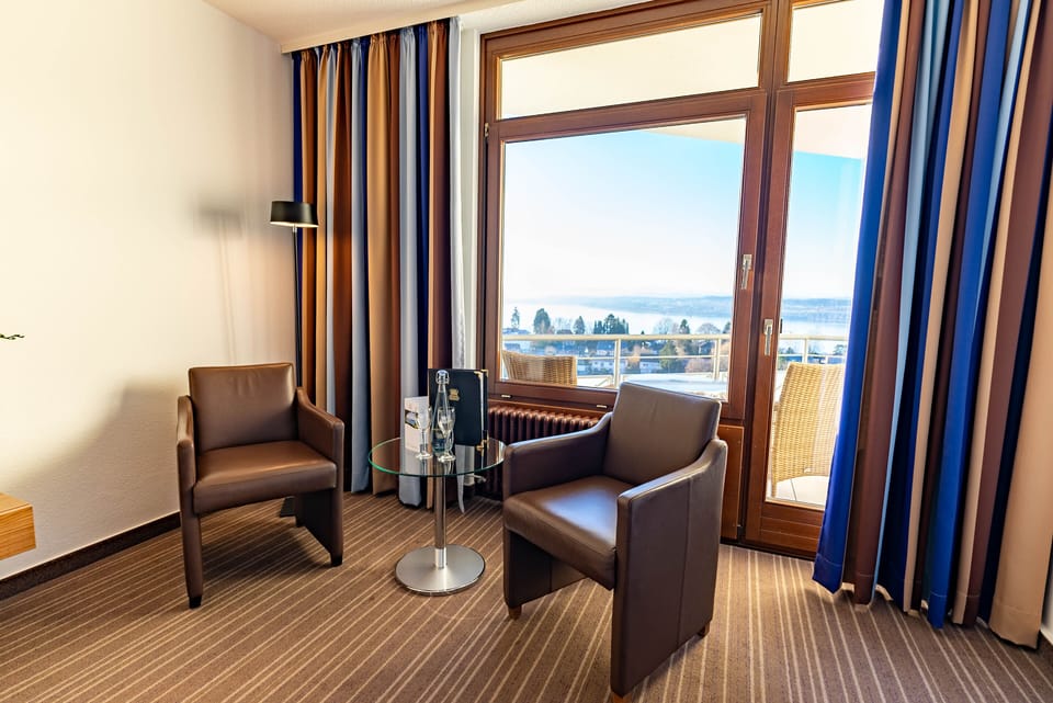 Double Room, Lake View | Hypo-allergenic bedding, free minibar items, in-room safe