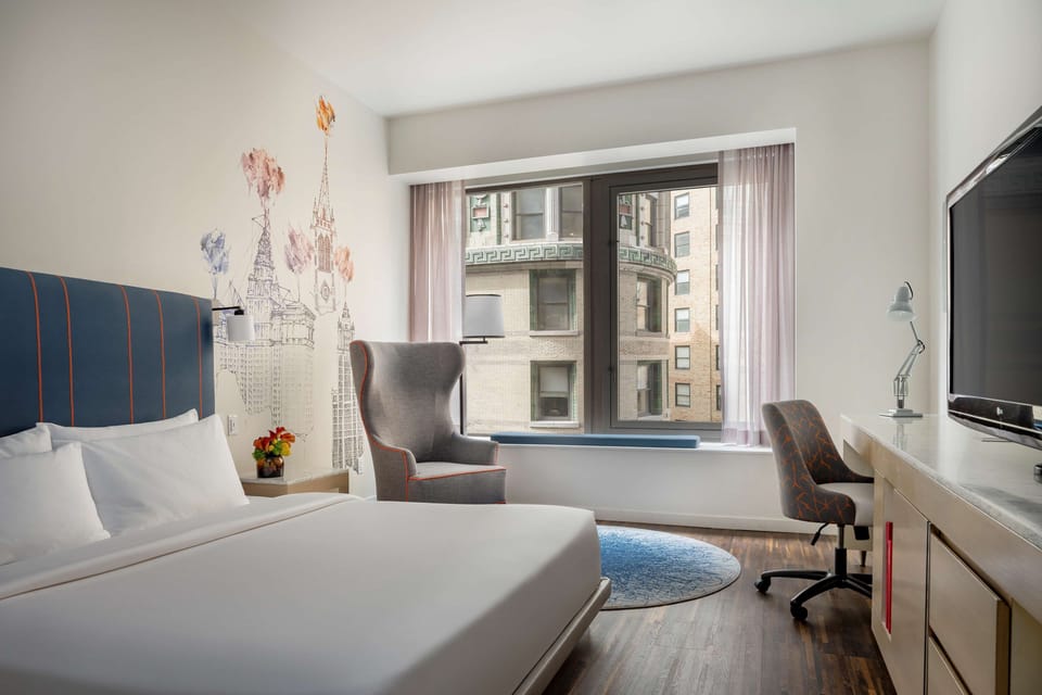 Premium bedding, down comforters, pillowtop beds, in-room safe