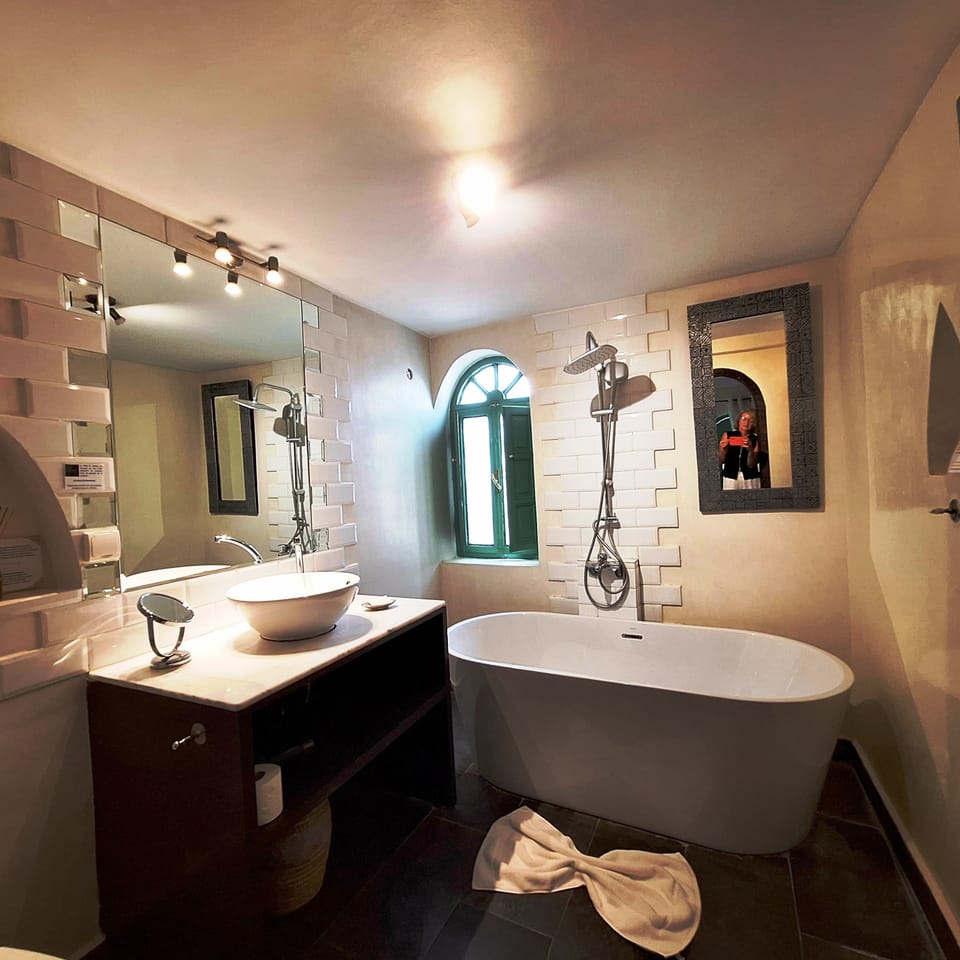 Junior Suite | Bathroom | Designer toiletries, hair dryer, towels